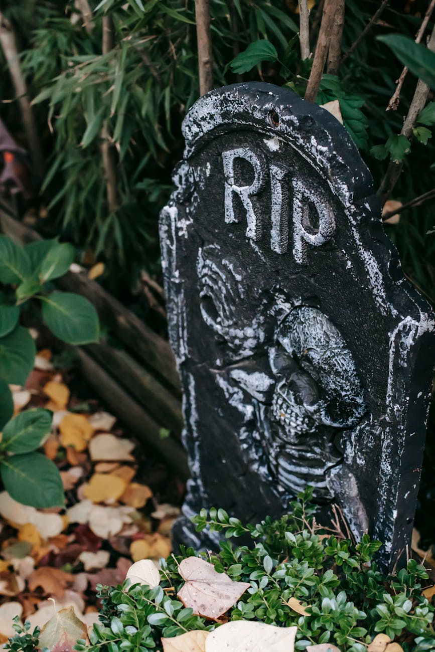 fake gravestone placed as decoration for halloween celebration