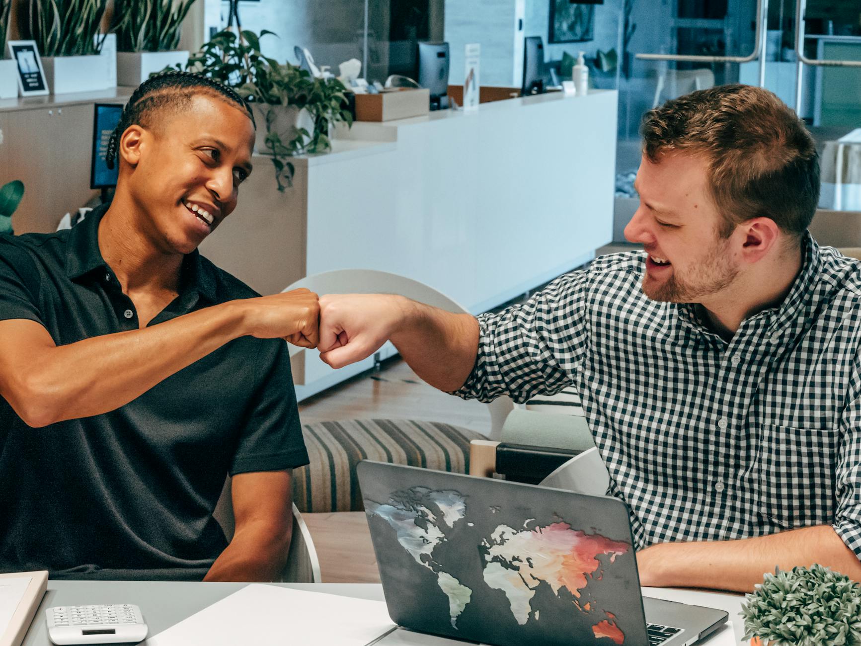 men doing fist bump