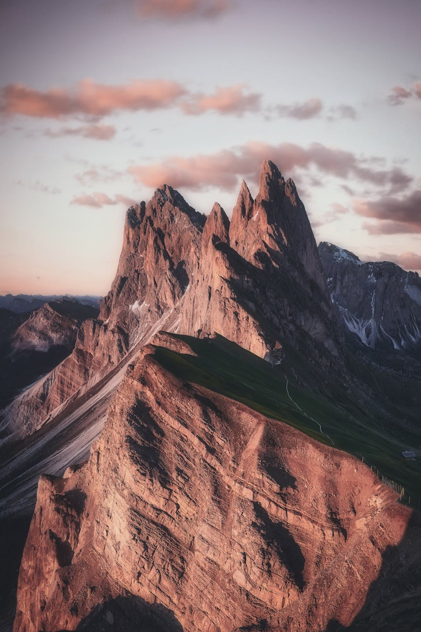 mountain range under beige sky