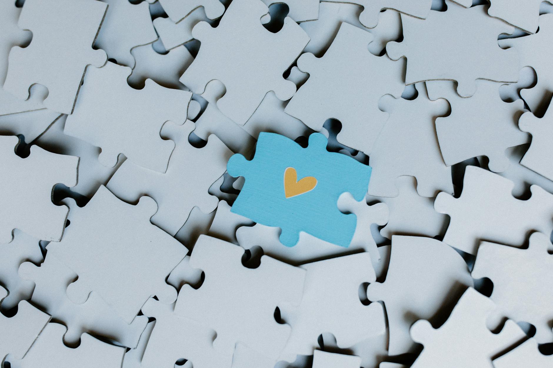 heart shape on a blue puzzle piece