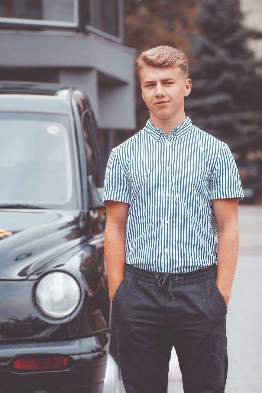 photo of man near car
