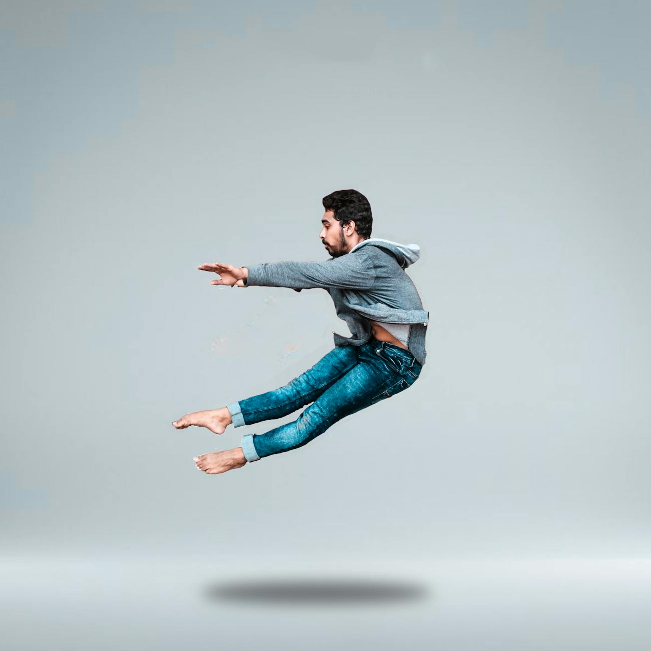 man jumping on mid air