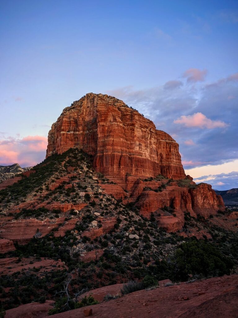 brown rocky mountain under blue sky