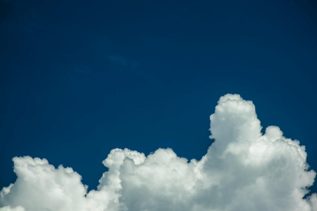 white clouds in blue sky