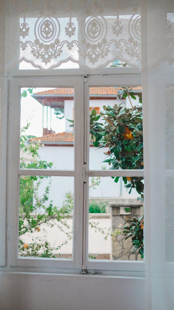 rustic house window with curtains