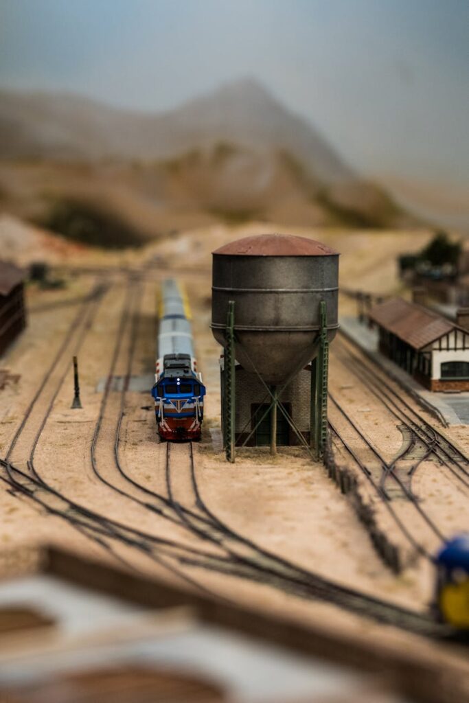 model train on desert railway landscape