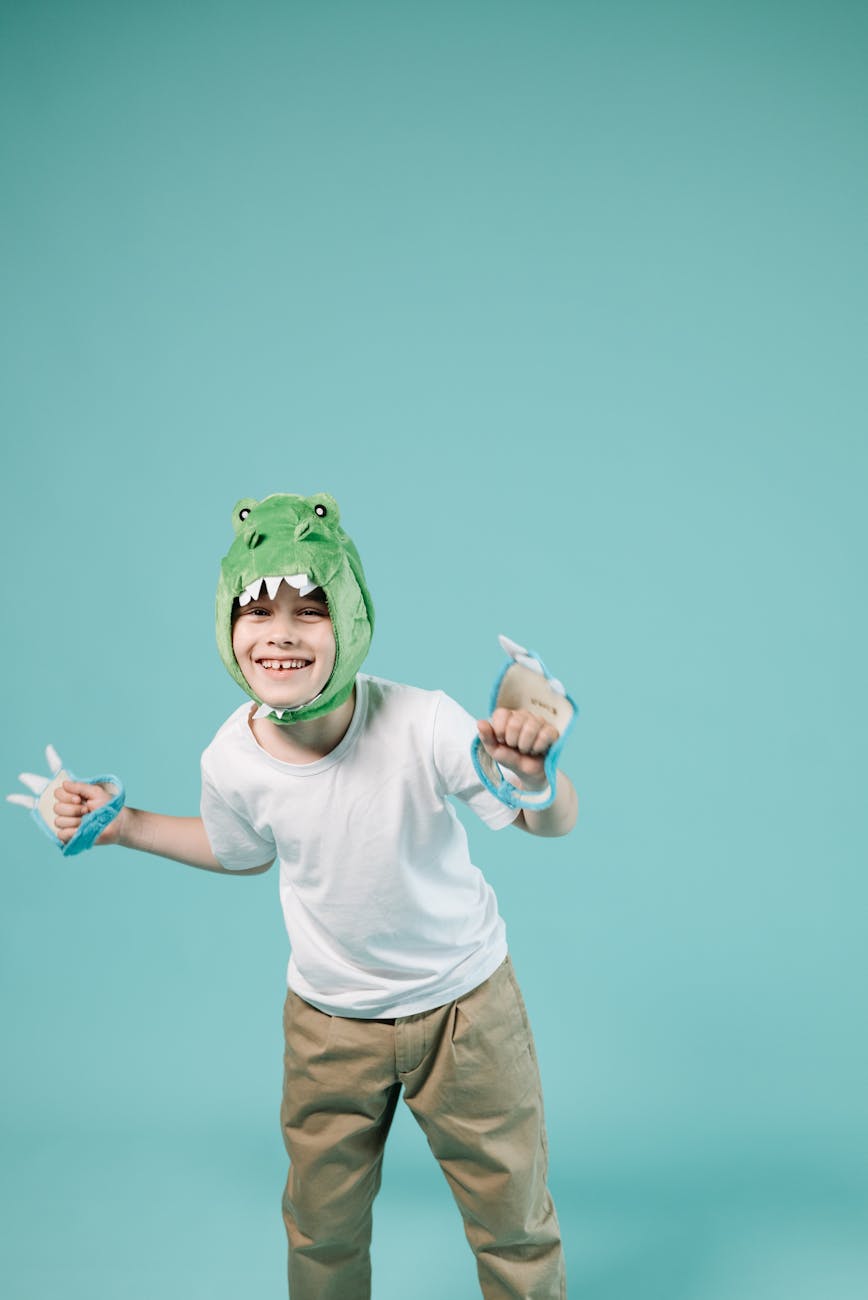 boy in white shirt wearing a costume