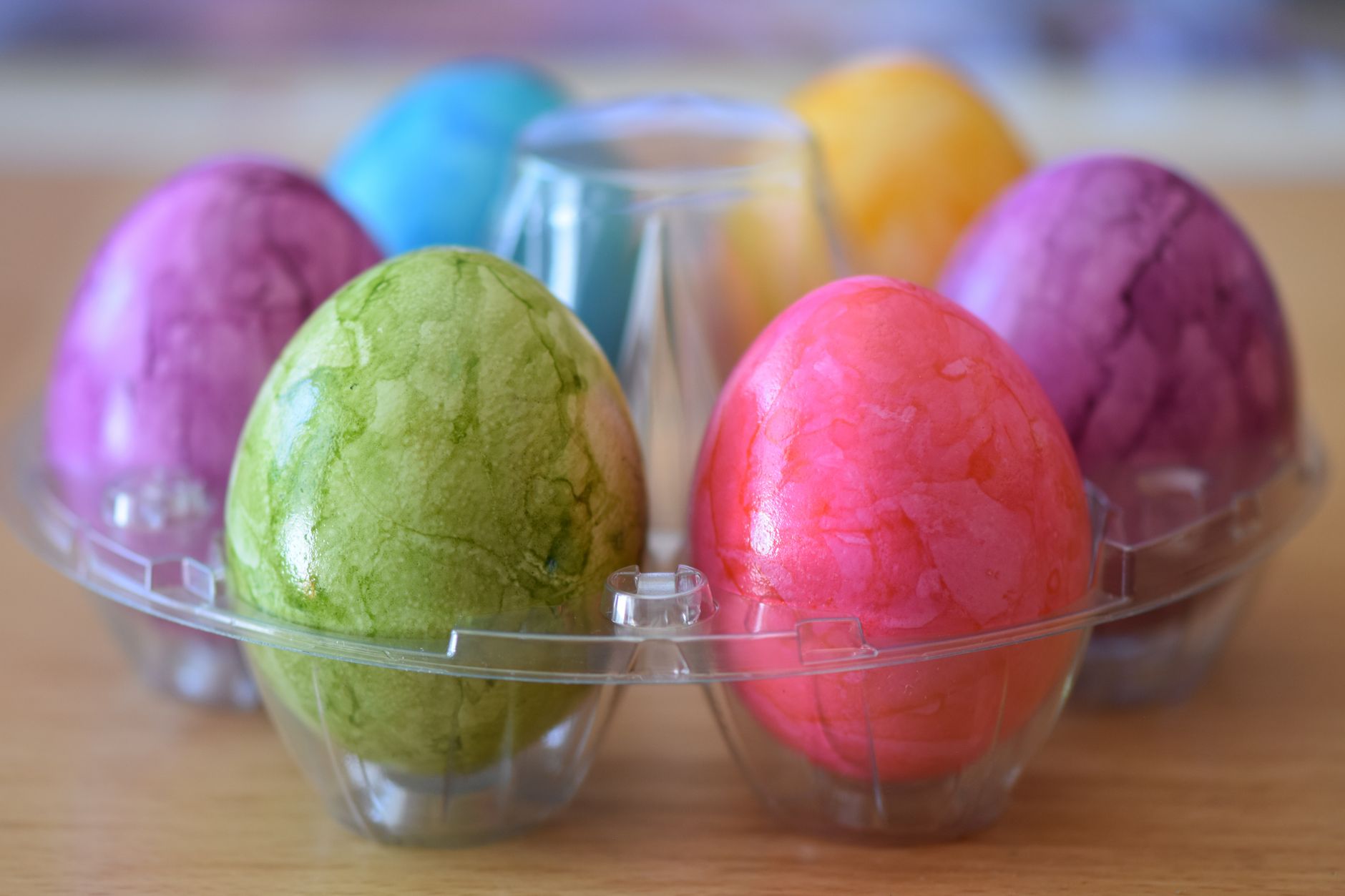 colorful dyed easter eggs in a tray