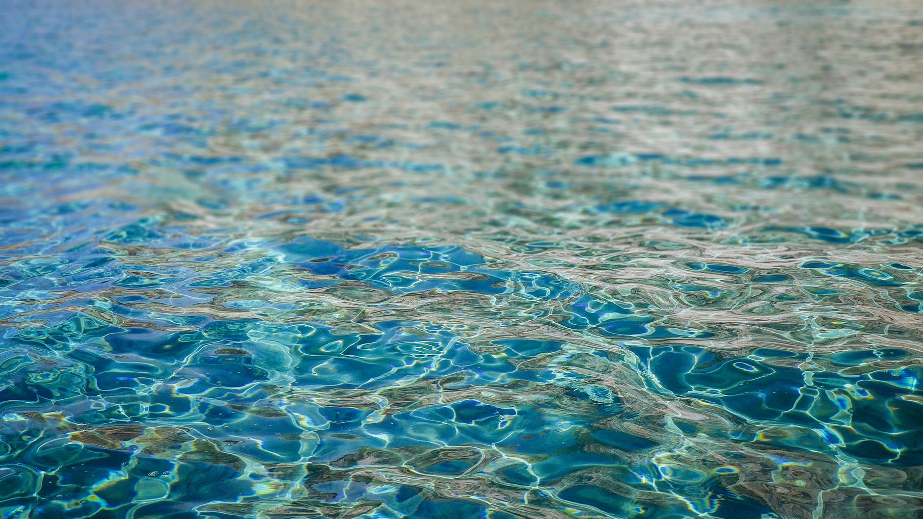 a close up of the water in a pool