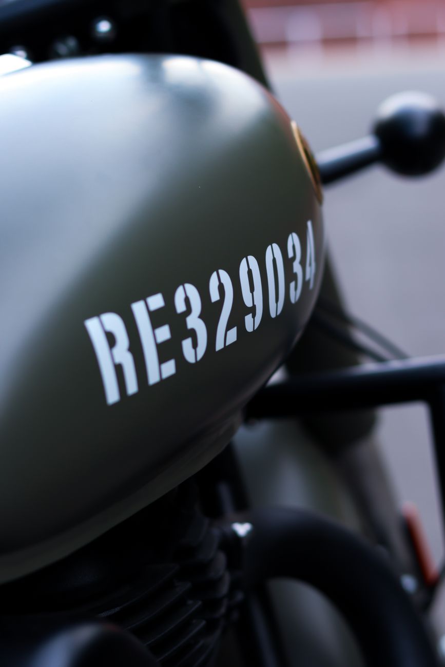 close up of black motorbike on street